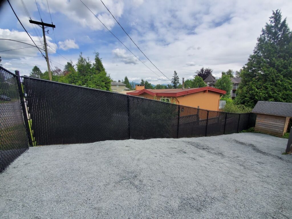 Brown chain link fencing for backyard privacy