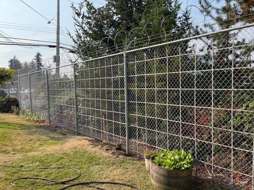 Green chain link fence around sports field